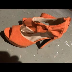 Orange peep toe platform pumps